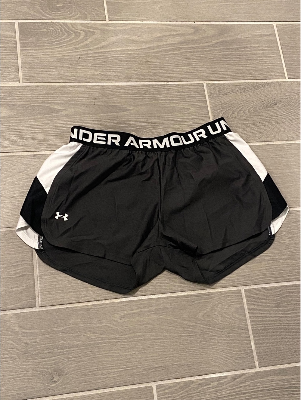 Under Armour Loose Fit Black Athletic Shorts with White Accents, Size Medium